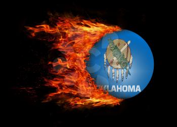 Concept of speed - US state flag with a trail of fire - Oklahoma