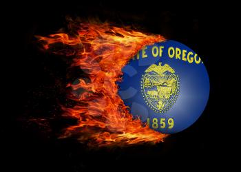 Concept of speed - US state flag with a trail of fire - Oregon