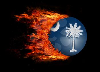 Concept of speed - US state flag with a trail of fire - South Carolina