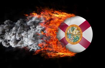 Concept of speed - Flag with a trail of fire and smoke - Florida