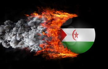 Concept of speed - Flag with a trail of fire and smoke - Western Sahara