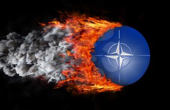 Concept of speed - Flag with a trail of fire and smoke - NATO