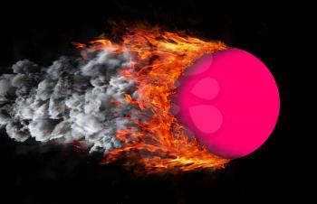 Concept of speed - Ball with a trail of fire and smoke - pink