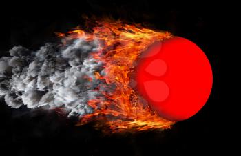 Concept of speed - Ball with a trail of fire and smoke - red