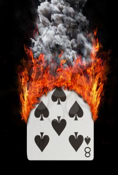 Playing card with fire and smoke, isolated on white - Eight of spades