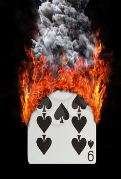Playing card with fire and smoke, isolated on white - Nine of spades