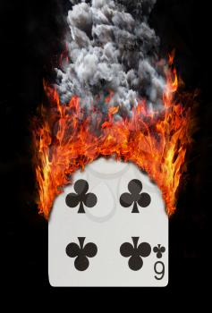 Playing card with fire and smoke, isolated on white - Six of clubs