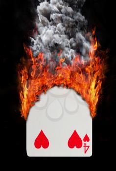 Playing card with fire and smoke, isolated on white - Four of hearts
