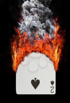 Playing card with fire and smoke, isolated on white - Two of spades