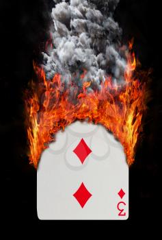 Playing card with fire and smoke, isolated on white - Three of diamonds
