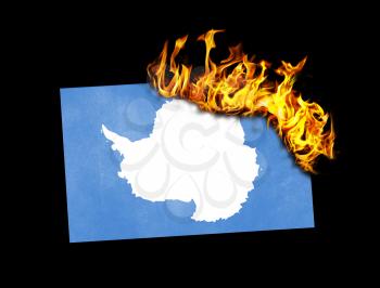 Flag burning - concept of war or crisis - Antarctica