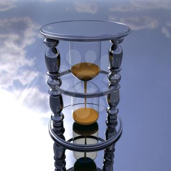 Chrome hourglass on a chrome reflective background