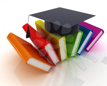 Colorful books and graduation hat on a white background