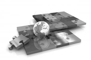 Puzzles and earth.Isolated on white background.3d rendered. 