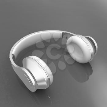 White headphones isolated on a red background 