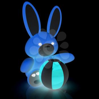 soft toy hare and colorful aquatic ball on a black background