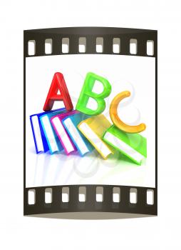 alphabet on a colorful real books on white background. The film strip