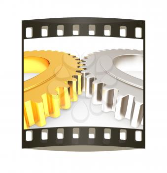 Gear set on a white background. The film strip