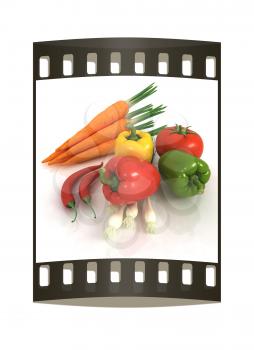 fresh vegetables with green leaves on a white background. The film strip