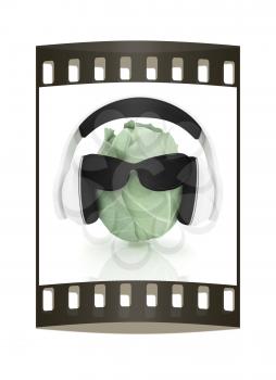 Green cabbage with sun glass and headphones front face on a white background. The film strip