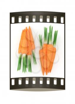 Heap of carrots on a white background. The film strip
