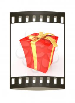 Red gift with gold ribbon on a white background. The film strip