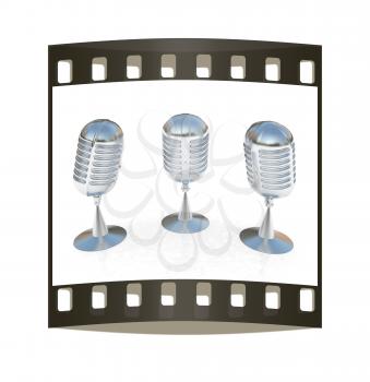 3 metal microphones on a white background. The film strip