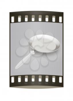 Pan with handle on light gray background. The film strip