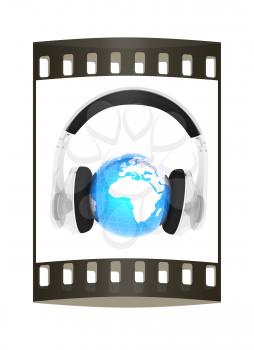 Blue earth with headphones from transparent plastic. World music concept isolated on white. The film strip