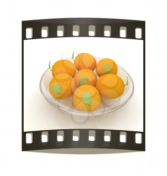 Oranges with leaves on a white background. The film strip