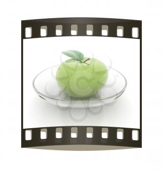 apple on a plate on a white background. The film strip