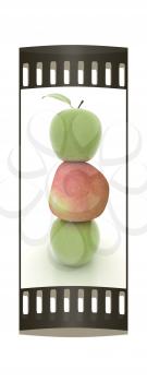 Spa still life from apples on a white background. The film strip