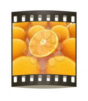 oranges and half oranges background. The film strip