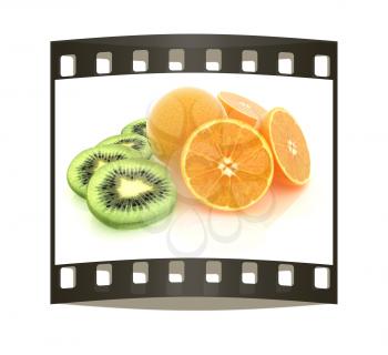 slices of kiwi, orange and half orange on a white. The film strip