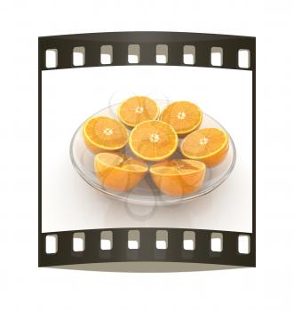 half oranges on a plate on a white background. The film strip