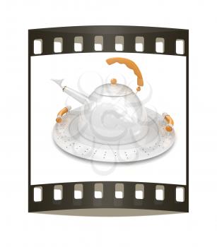 Teapot on a platter on a white background. The film strip