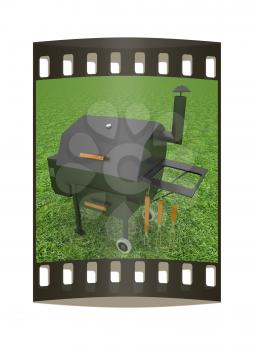 oven barbecue grill on the green grass. The film strip