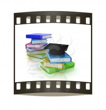 Graduation hat with books on a white background. The film strip