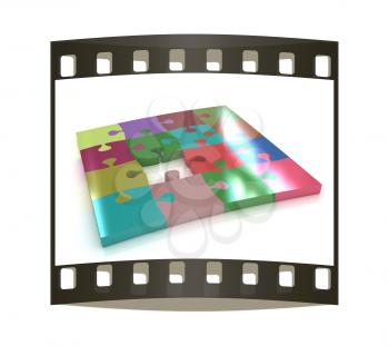 Many-colored puzzle pattern (removable pieces). The film strip