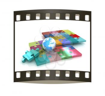 Puzzles and earth.Isolated on white background.3d rendered. The film strip