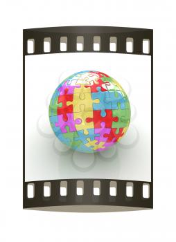 Sphere collected from colorful puzzle on a white background. The film strip