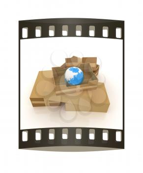 Cardboard boxes and earth. The film strip