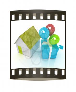 House with gift and ballons on a white background. The film strip