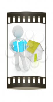 3d man with gift and house on a white background. The film strip