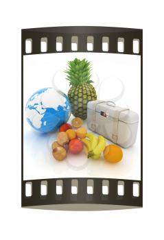 Citrus,earth and traveler's suitcase on a white background. The film strip