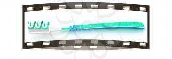 Toothbrush on a white background. The film strip