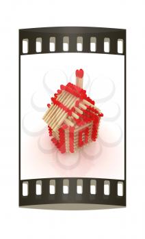 Log house from matches pattern on white. The film strip