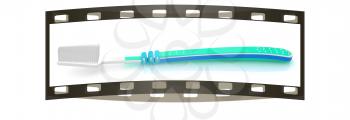 Toothbrush on a white background. The film strip 