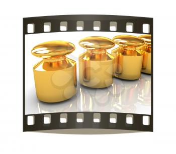 Gold weight scale on a white. The film strip