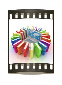Laptop and books on a white background. The film strip